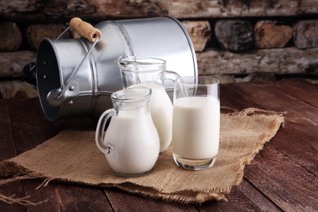 A,Jug,Of,Milk,And,Glass,Of,Milk,On,A